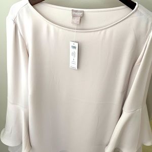 Brand new, never worn taupe puff sleeve blouse.